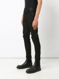 coated split knee jeans