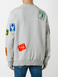 multi patched sweatshirt 