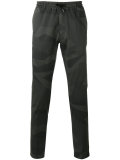 camouflage print trousers