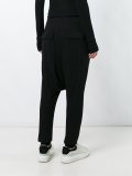 drop-crotch track pants