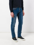 stonewashed slim-fit jeans