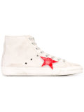star patch distressed trainers