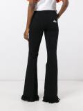 frayed flared trousers 