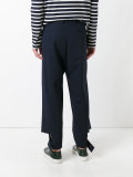 buttoned tab trousers