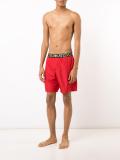 Iconic Greca Medusa swim shorts