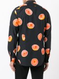 orange print shirt
