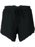 over-the-knee frayed shorts