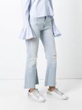 distressed flared jeans