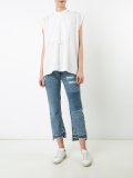 patch and frayed jeans