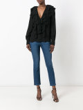 deep V-neck ruffled blouse