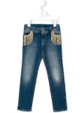 fringed pocket slim jeans