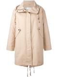 zipped up parka coat