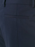 buttoned tab trousers