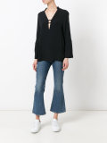 deep V-neck blouse