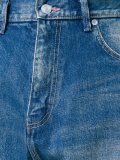 splattered tapered jeans