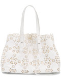 laser cut floral shoulder bag