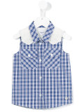 checked sleeveless shirt