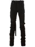 elongated strappy skinny jeans