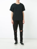 distressed track pants