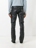 coated effect trousers
