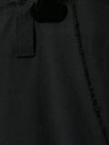 frayed flared trousers