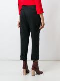 creased effect trousers