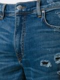 distressed slim jeans