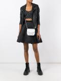 lion pins crossbody bag