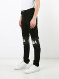 printed text trousers 