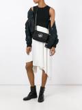 lion plaque shoulder bag