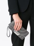 embellished perforated clutch