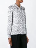 faces print shirt 