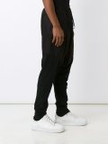 drop-crotch track pants