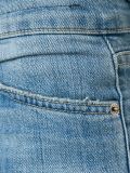 distressed skinny jeans