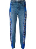 racing stripe tapered jeans
