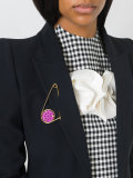 button brooch