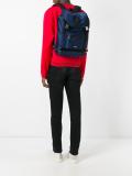 strap fastening backpack