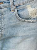 distressed slim jeans