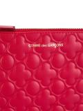 embossed zipped clutch