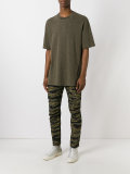 camouflage print trousers 