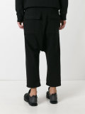 drop-crotch track pants