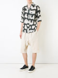 drop-crotch track shorts