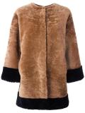 collarless buttoned jacket