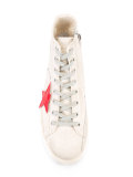 star patch distressed trainers