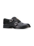 studded tiger's head brogues