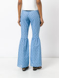 fitted patterned flare trousers