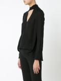 deep V-neck longsleeved blouse