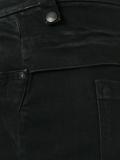 elongated strappy skinny jeans