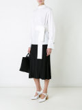 back button fastening shirt