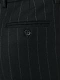 pinstriped pleated tapered trousers